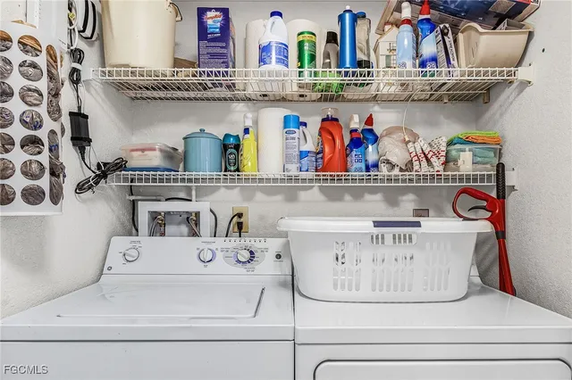 a bathroom with a granite countertop sink toilet and a mirror