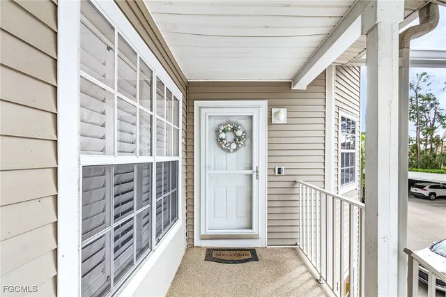 a room with furniture and flat screen tv
