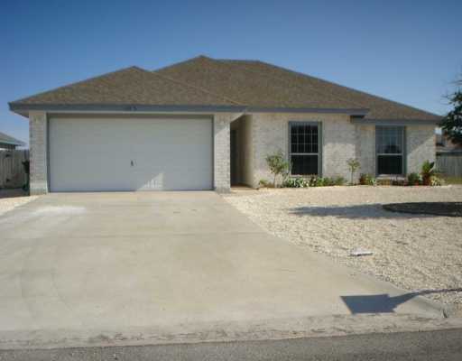 a front view of house with yard