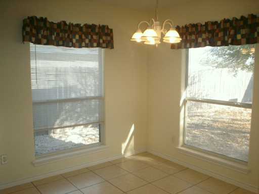 13965 Windjammer Drive Corpus Christi, TX 78418 - Photo 5 of 10 a view of a room has a window and painted walls