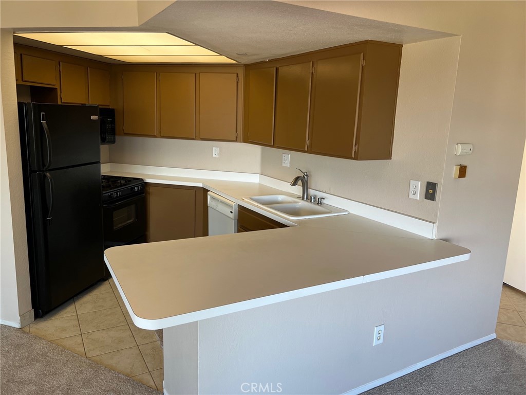 1040 Calle Del Cerro, Unit 108 San Clemente, CA 92672 - Photo 12 of 26 Kitchen