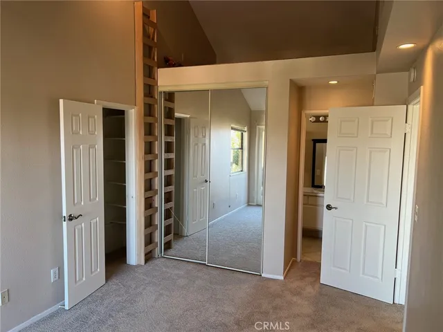 a room with furniture and a potted plant