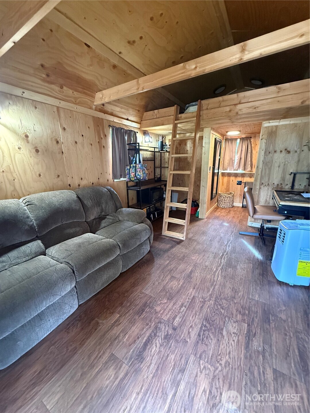 1102 Cline Road Randle, WA 98377 - Photo 17 of 22 a living room with furniture and a wooden floor