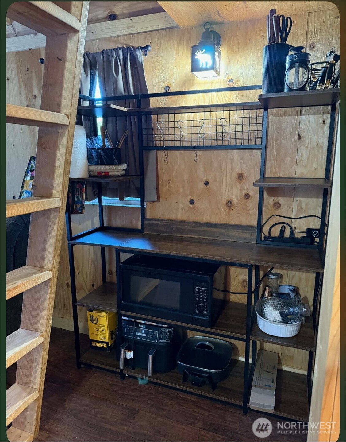 1102 Cline Road Randle, WA 98377 - Photo 20 of 22 a living room with furniture and wooden floor