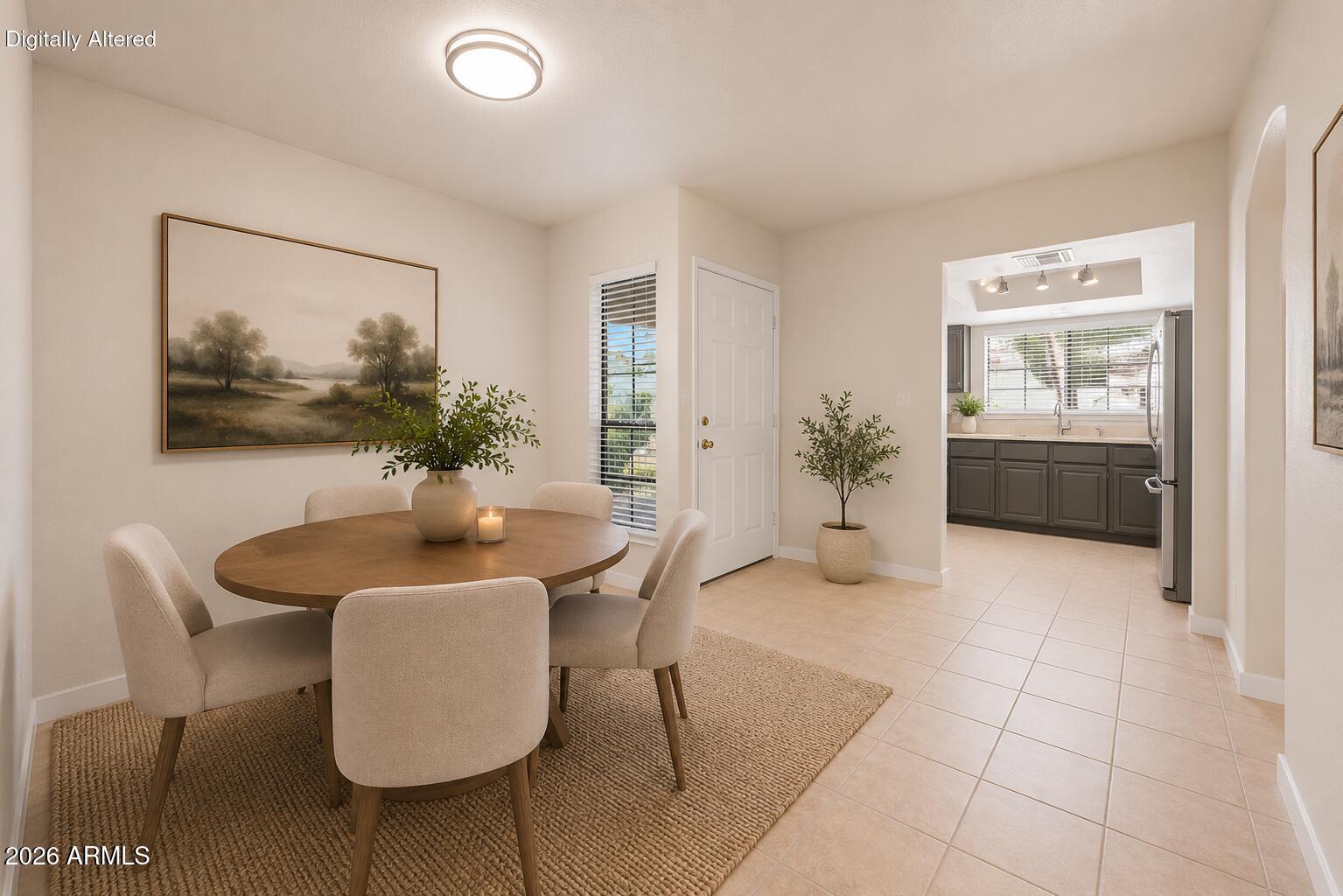 6885 East Cochise Road, Unit 142 Paradise Valley, AZ 85253 - Photo 13 of 47 a living room with furniture and a potted plant