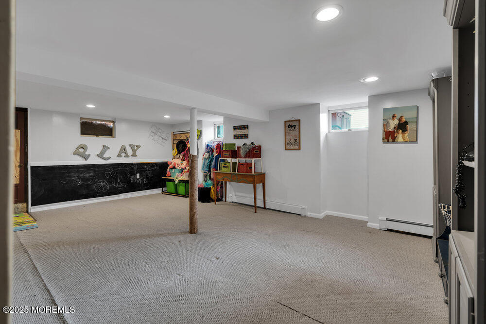 506 Crestview Terrace Point Pleasant, NJ 08742 - Photo 17 of 24 a view of a livingroom with furniture and a garage