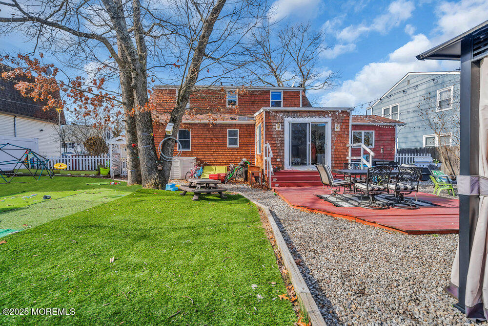 506 Crestview Terrace Point Pleasant, NJ 08742 - Photo 21 of 24 a view of a house with backyard and sitting area