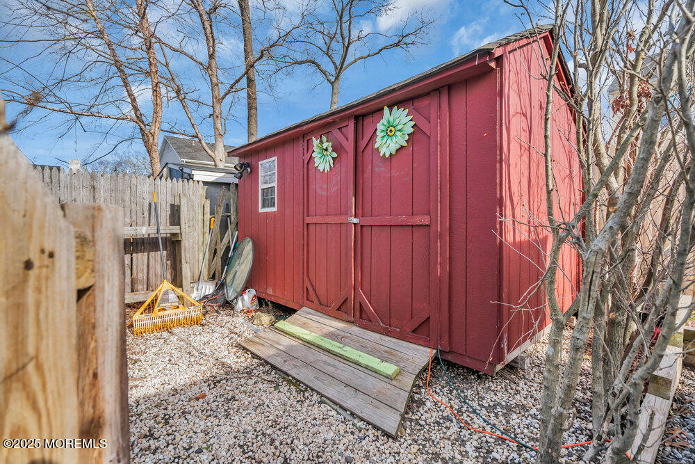 506 Crestview Terrace Point Pleasant, NJ 08742 - Photo 23 of 24 a view of a backyard with a small cabin