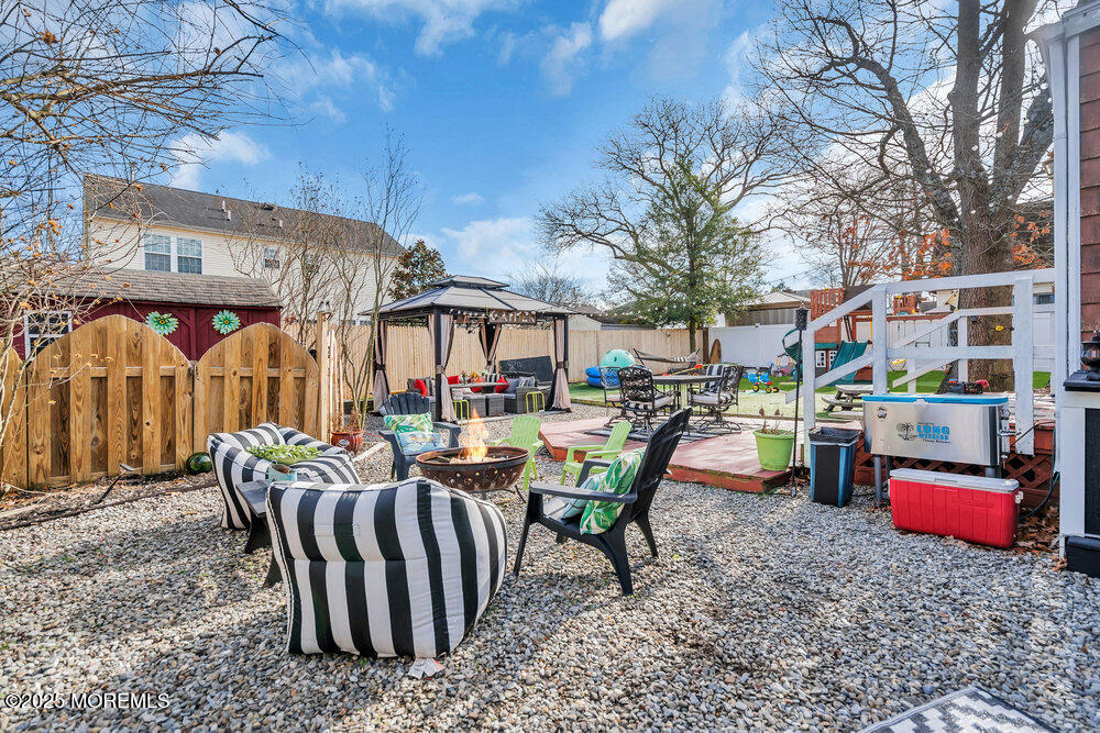 506 Crestview Terrace Point Pleasant, NJ 08742 - Photo 24 of 24 a view of a patio with a table and chairs