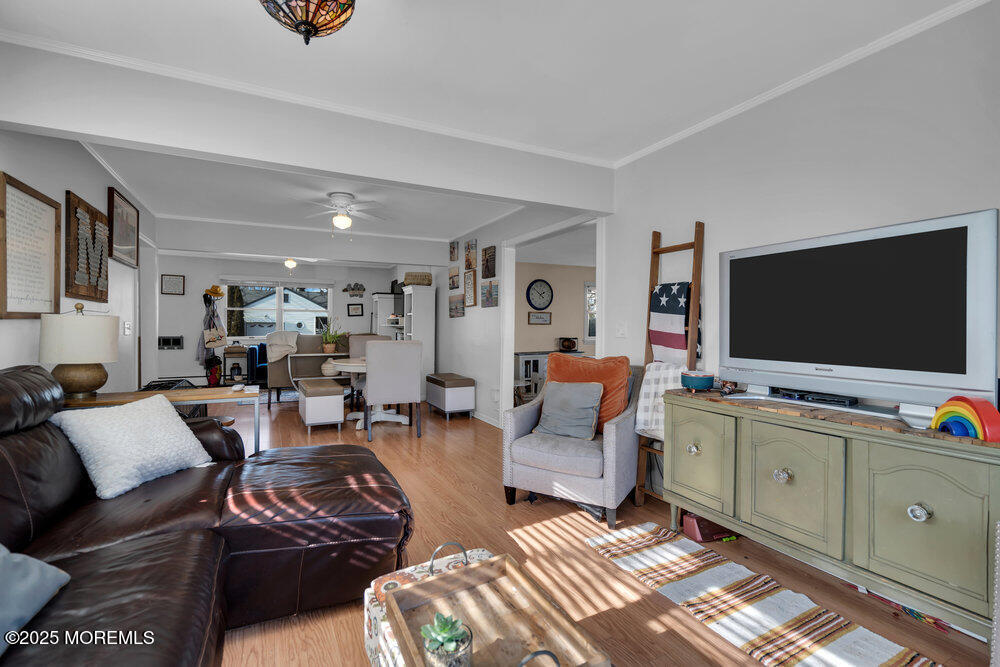 506 Crestview Terrace Point Pleasant, NJ 08742 - Photo 5 of 24 a living room with furniture and a flat screen tv
