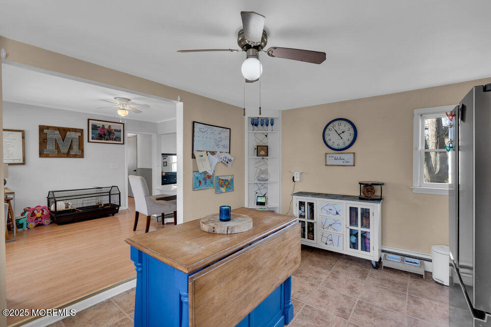 506 Crestview Terrace Point Pleasant, NJ 08742 - Photo 7 of 24 a view of kitchen island a sink and a stove top oven