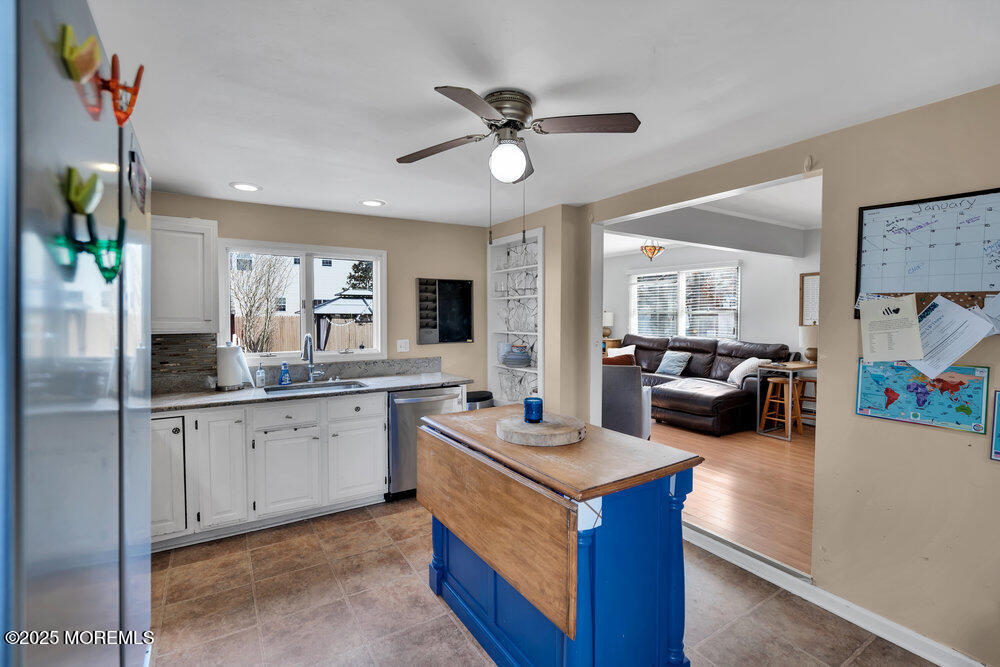 506 Crestview Terrace Point Pleasant, NJ 08742 - Photo 8 of 24 a kitchen with sink and refrigerator