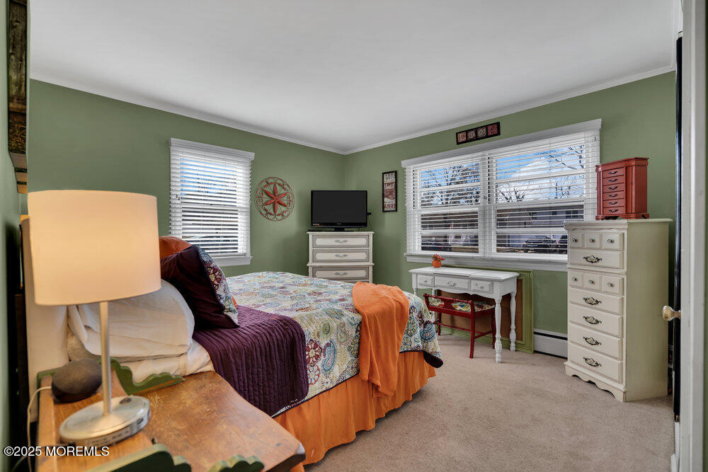 506 Crestview Terrace Point Pleasant, NJ 08742 - Photo 10 of 24 a bedroom with a bed and a desk