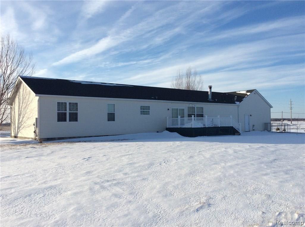 11350 Palmer Road Maybee, MI 48159 - Photo 21 of 22 LARGE DECK, PATIO, NICE LANDSCAPING - INVISIBLE FENCE AND KENNEL FOR FIDO TOO!