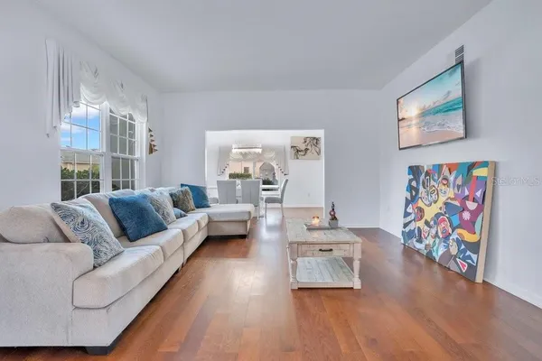 a living room with furniture and a rug