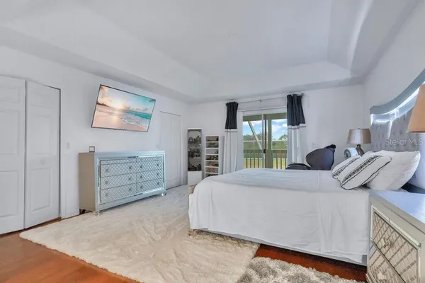 a workspace with furniture and a wooden floor