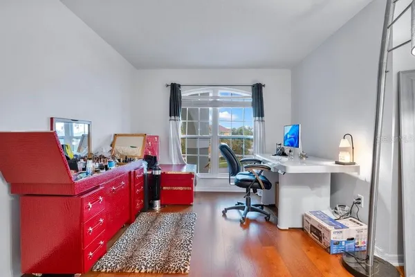 a bed room with a bed and a cabinets