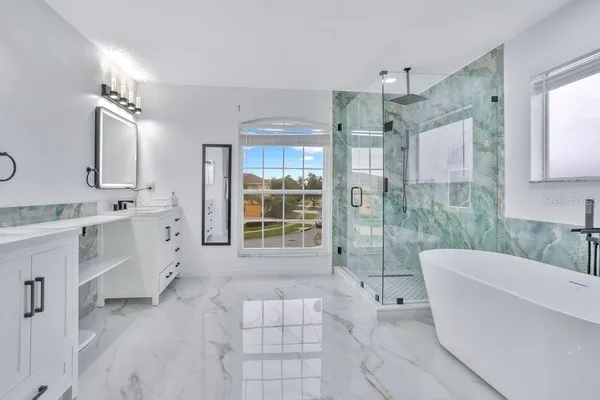 a living room with furniture and windows