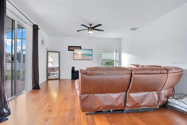 a living room with furniture and a table