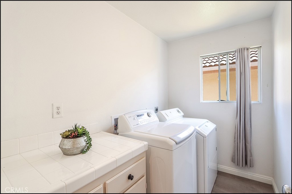 3 Delfin Aliso Viejo, CA 92656 - Photo 16 of 23 a utility room with dryer and washer