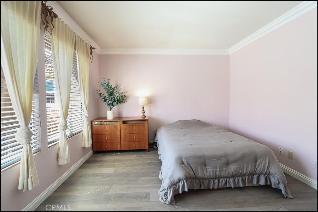 3 Delfin Aliso Viejo, CA 92656 - Photo 18 of 23 a bedroom with a bed and a couch