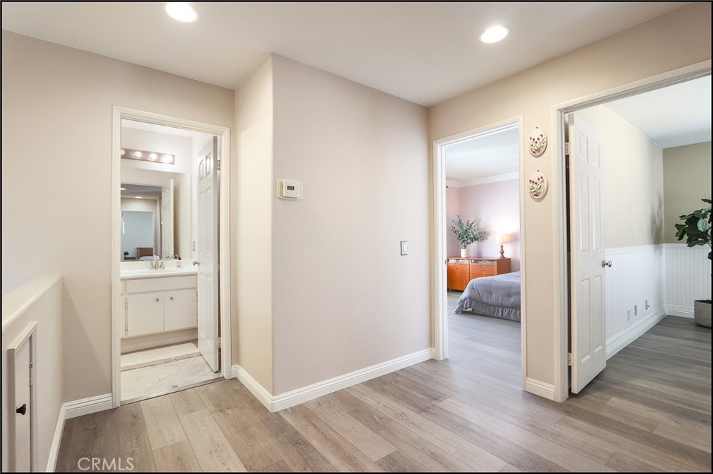 3 Delfin Aliso Viejo, CA 92656 - Photo 19 of 23 a view of a bathroom with tub shower bedroom and wooden floor