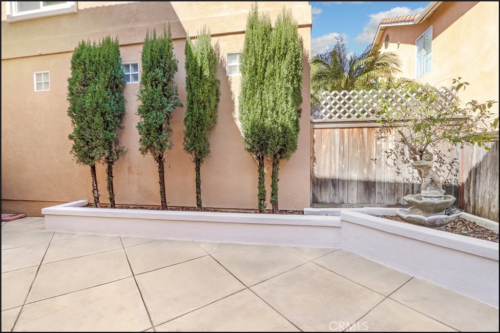 3 Delfin Aliso Viejo, CA 92656 - Photo 22 of 23 front view of a house with a yard