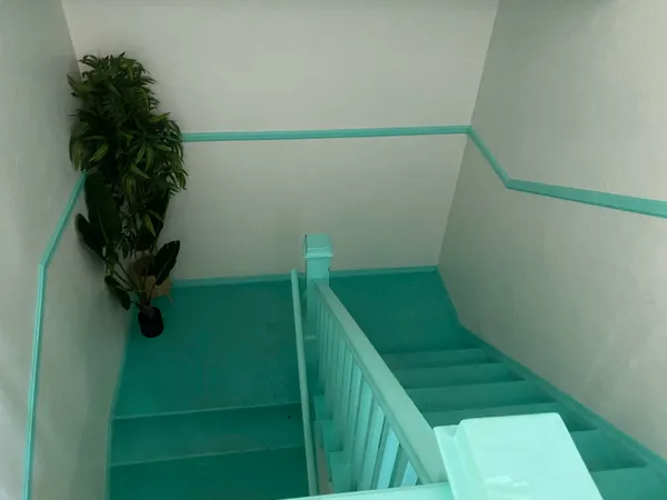 a view of a living room and bathroom