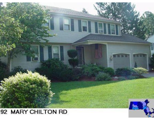 92 Mary Chilton Road Needham, MA 02492 - Photo 1 of 1 a view of a house with a yard and potted plants