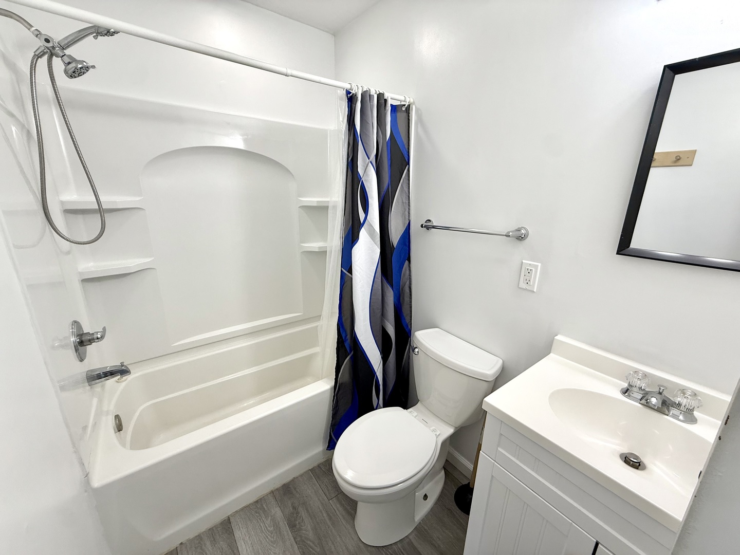 207 East Illinois Street Cambridge, IL 61238 - Photo 19 of 29 a bathroom with a toilet and a shower