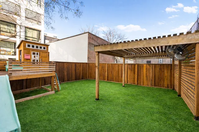 a view of a backyard with a garden