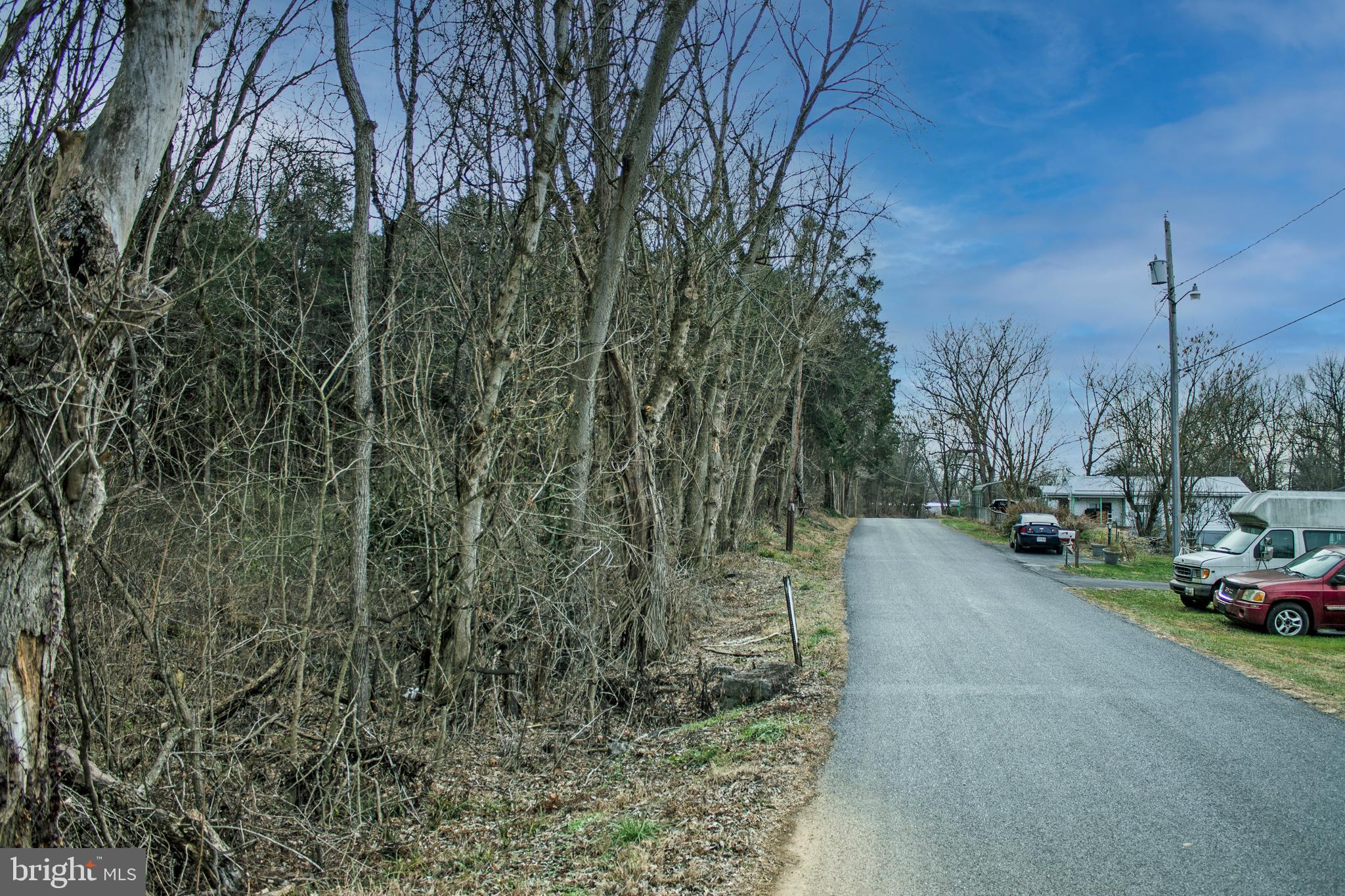 8103 Avis Mill Road Williamsport, MD 21795 - Photo 25 of 34 a view of a street with a parked cars