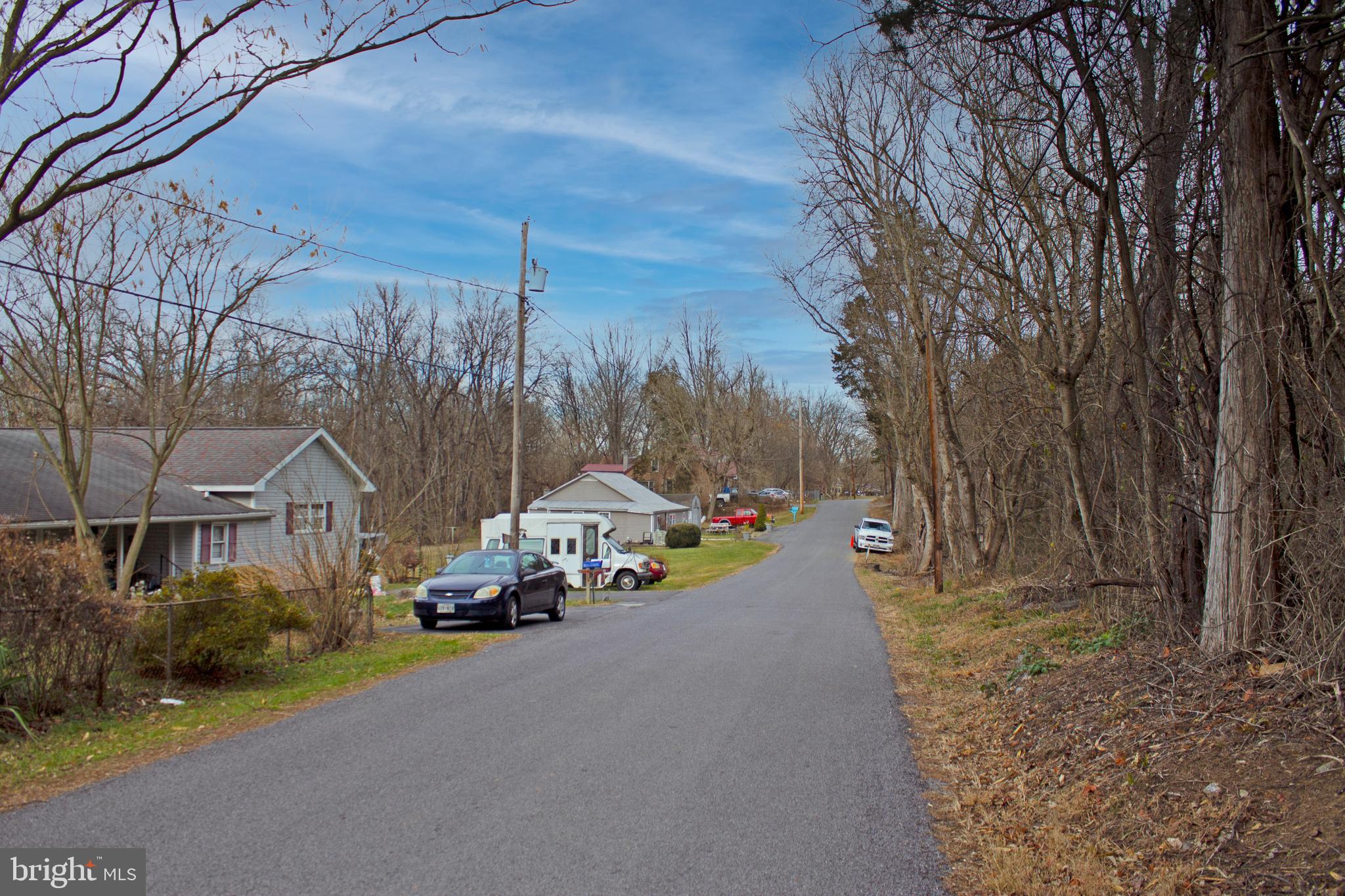 8103 Avis Mill Road Williamsport, MD 21795 - Photo 30 of 34 a view of a street with cars on road