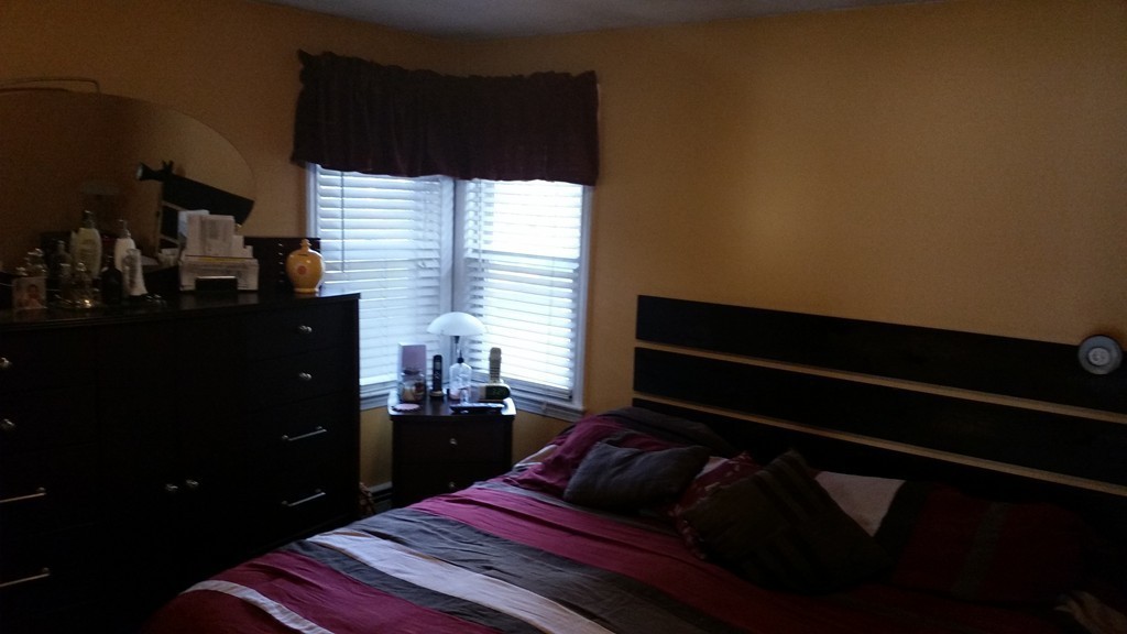 6 Anna Terrace Methuen, MA 01844 - Photo 5 of 11 a bedroom with a bed and a dresser