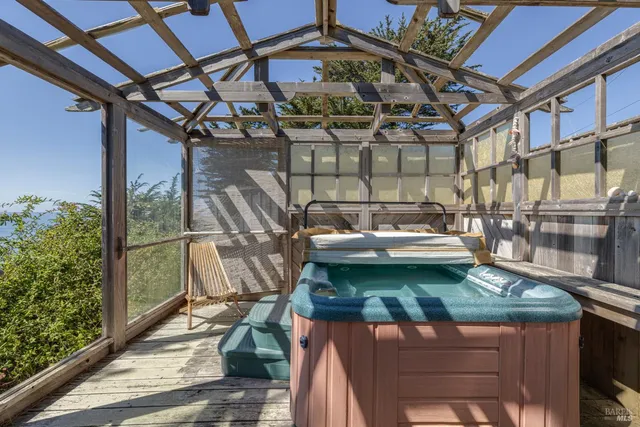 a kitchen with a stove a sink dishwasher and a refrigerator