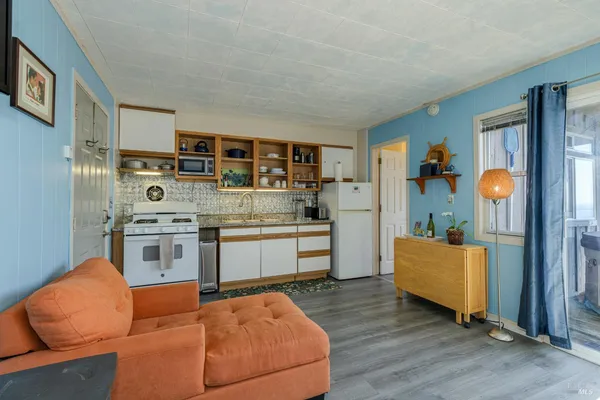 a bathroom with a shower and a sink