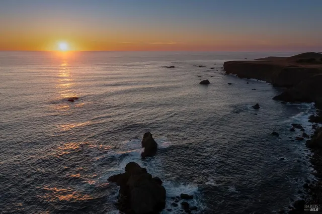 a view of a lake from a balcony
