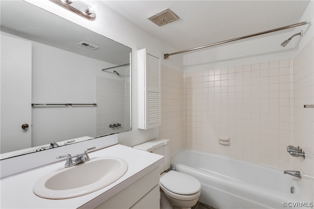10292 Iron Mill Road North Chesterfield, VA 23235 - Photo 21 of 24 a bathroom with a sink toilet and shower