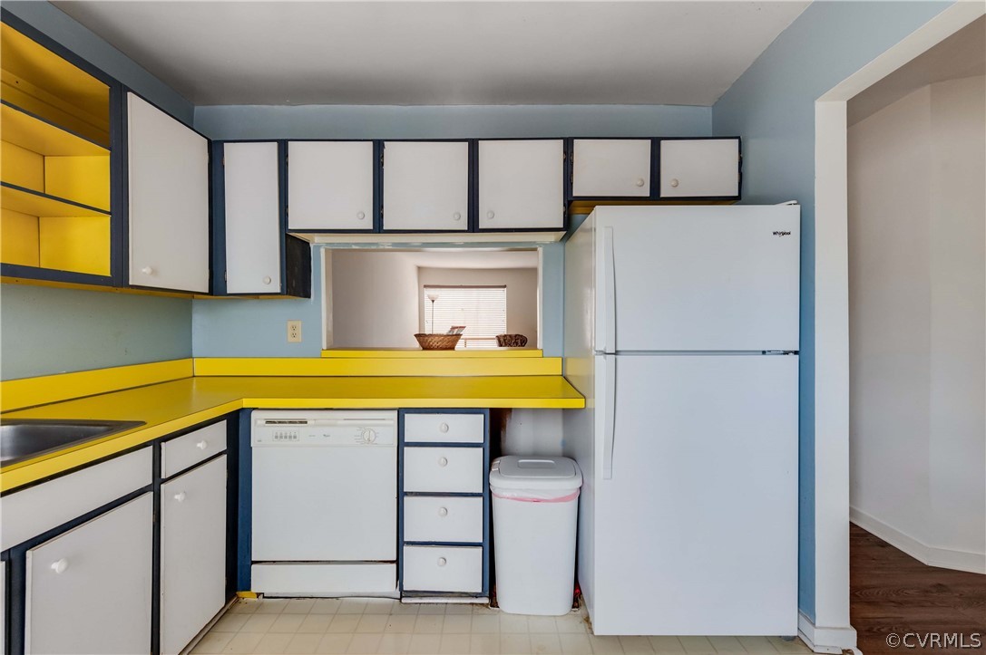 10292 Iron Mill Road North Chesterfield, VA 23235 - Photo 8 of 24 a view of a kitchen with a fridge and dishwasher