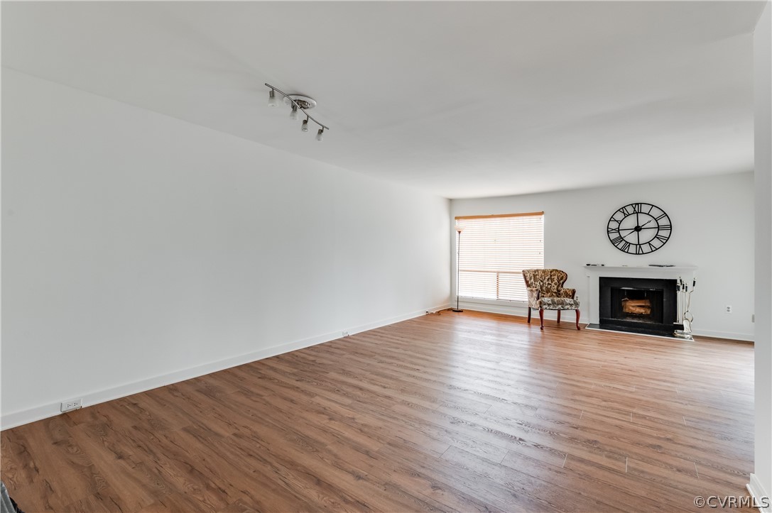 10292 Iron Mill Road North Chesterfield, VA 23235 - Photo 10 of 24 a view of a livingroom with wooden floor
