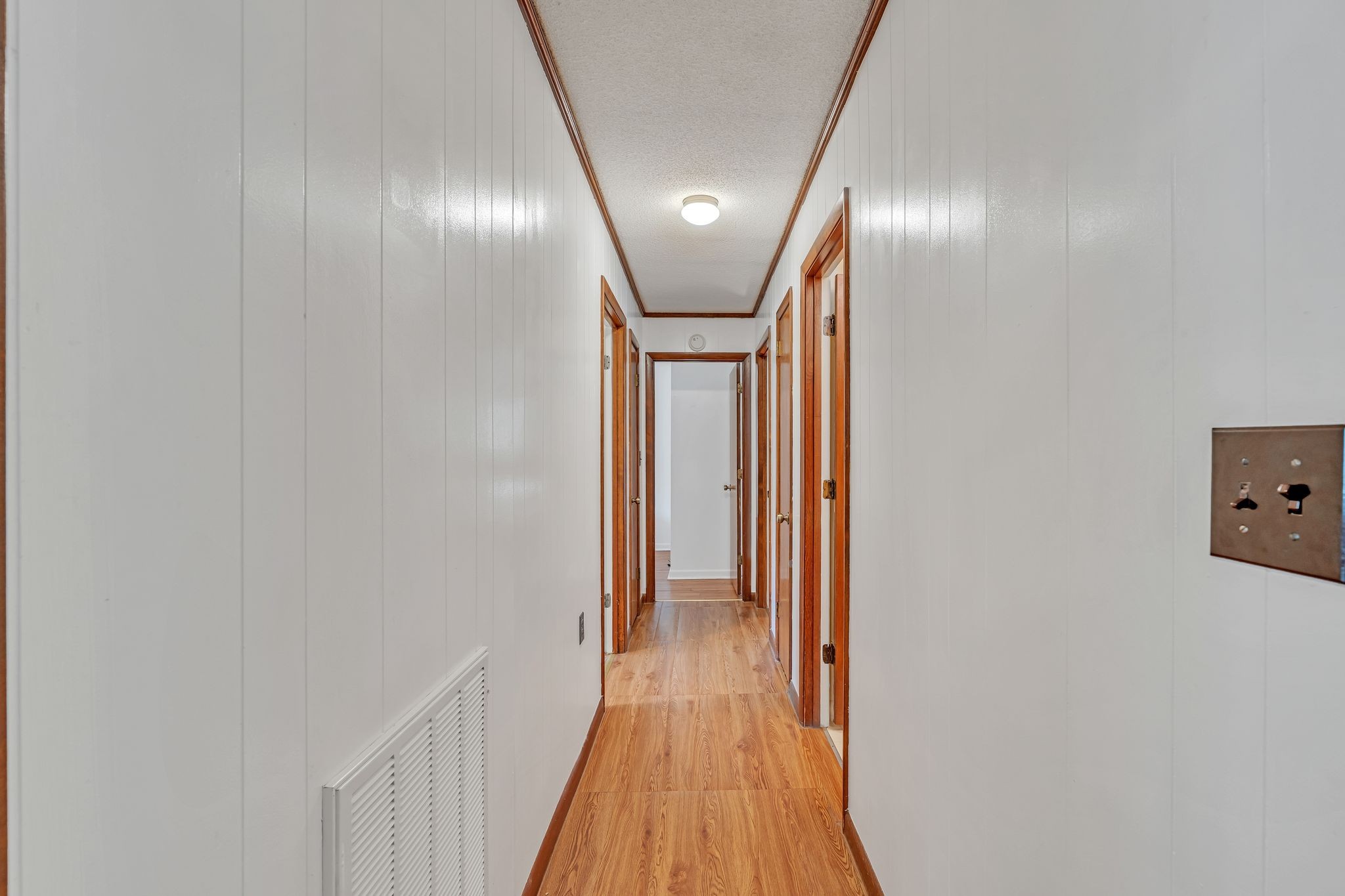 922 Hayes Road Lawrenceburg, TN 38464 - Photo 15 of 36 a view of hallway with wooden floor