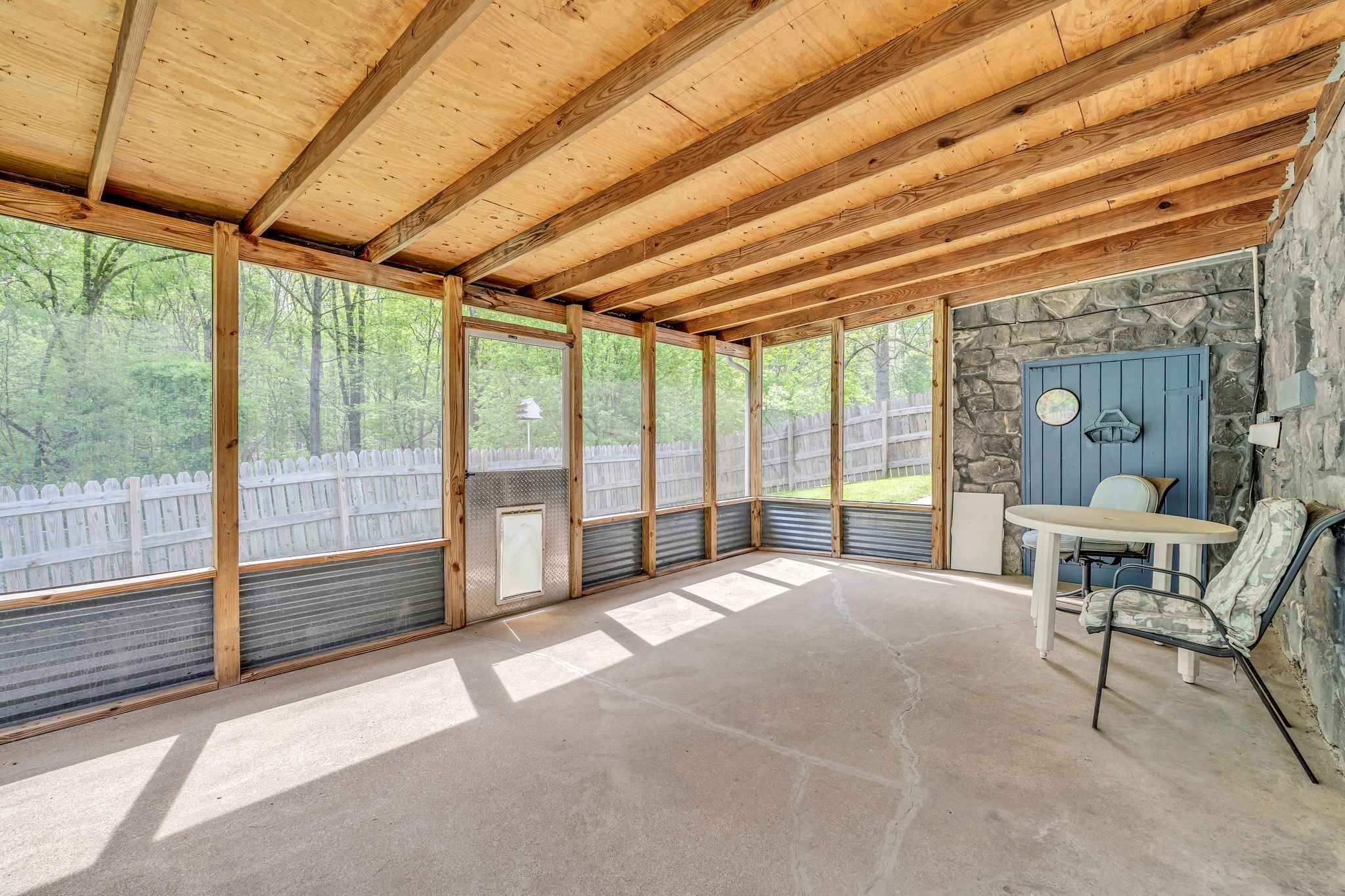 922 Hayes Road Lawrenceburg, TN 38464 - Photo 30 of 36 a spacious bedroom with a large bed and a large window