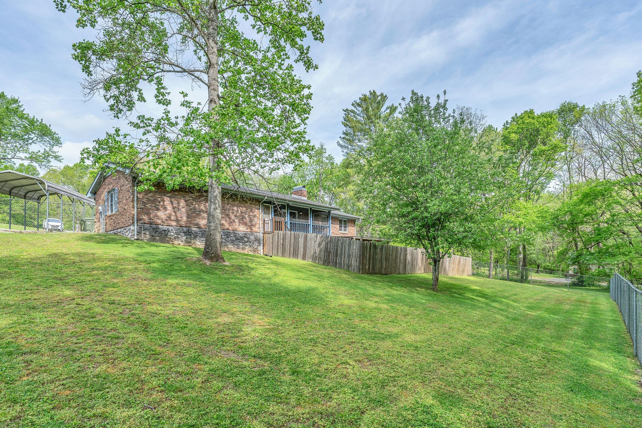 922 Hayes Road Lawrenceburg, TN 38464 - Photo 32 of 36 a view of a backyard with a garden