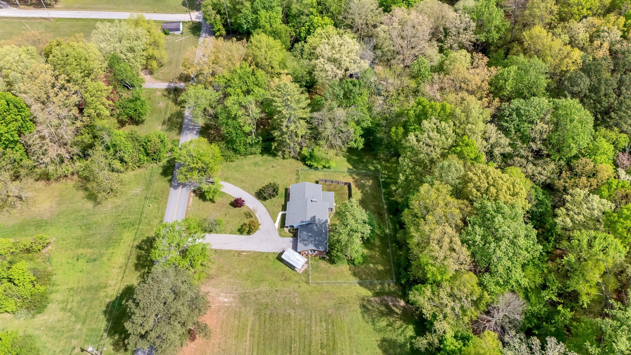 922 Hayes Road Lawrenceburg, TN 38464 - Photo 35 of 36 an aerial view of residential house with outdoor space and trees all around