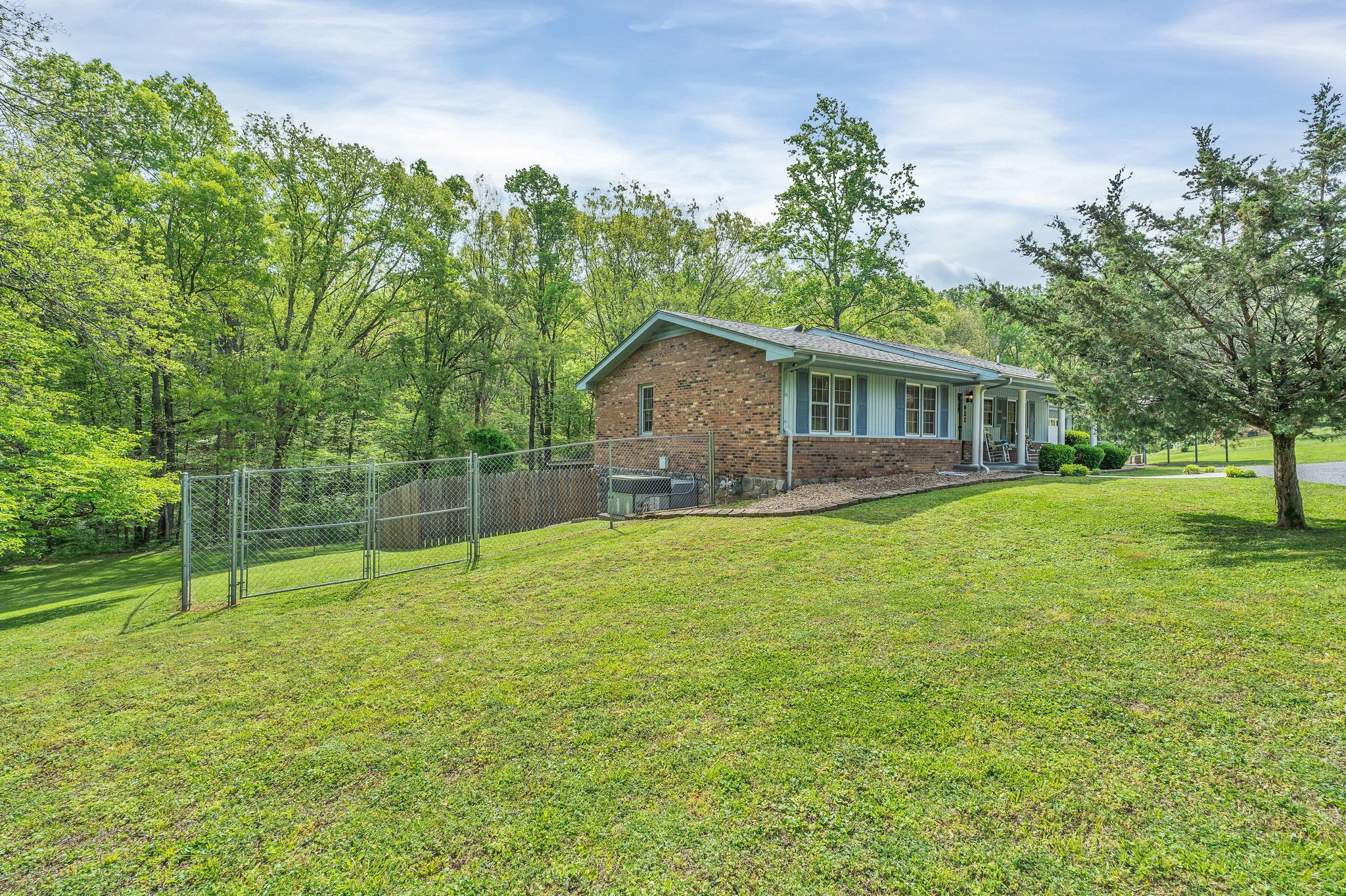922 Hayes Road Lawrenceburg, TN 38464 - Photo 4 of 36 a view of house with a backyard