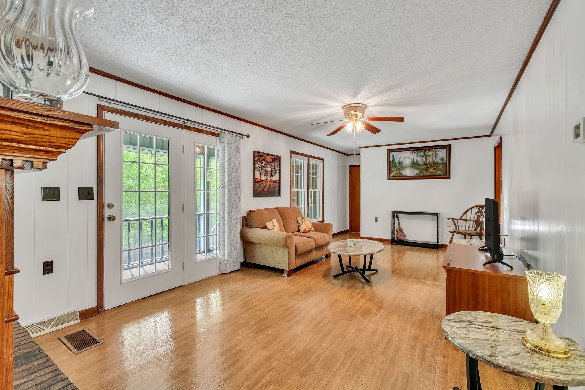 922 Hayes Road Lawrenceburg, TN 38464 - Photo 8 of 36 a living room with furniture and a large window