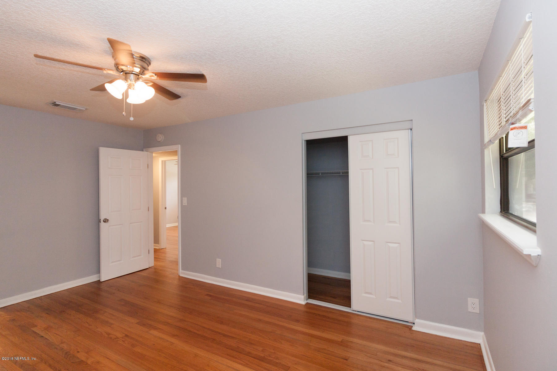 3328 Peeler Road Jacksonville, FL 32277 - Photo 21 of 35 Master Bedroom