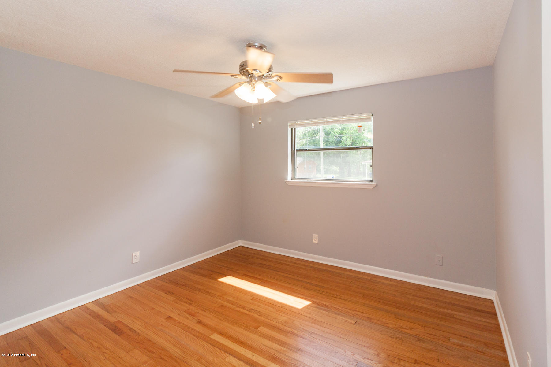 3328 Peeler Road Jacksonville, FL 32277 - Photo 30 of 35 Third Bedroom