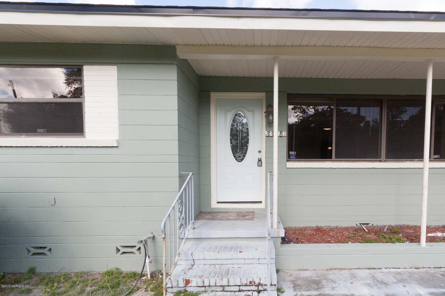3328 Peeler Road Jacksonville, FL 32277 - Photo 5 of 35 Front Door