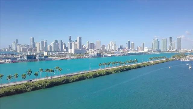 a view of a swimming pool with a lounge chairs